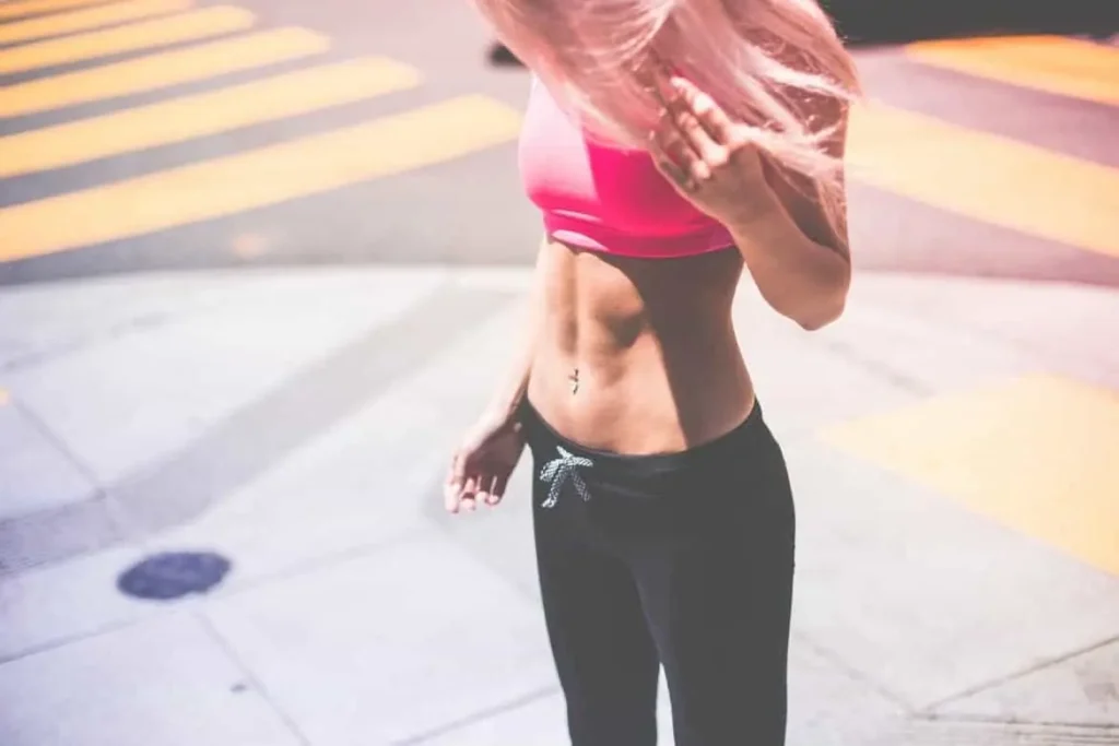 Woman with toned stomach after LA-EMS Body Sculpting Treatment Walthamstow